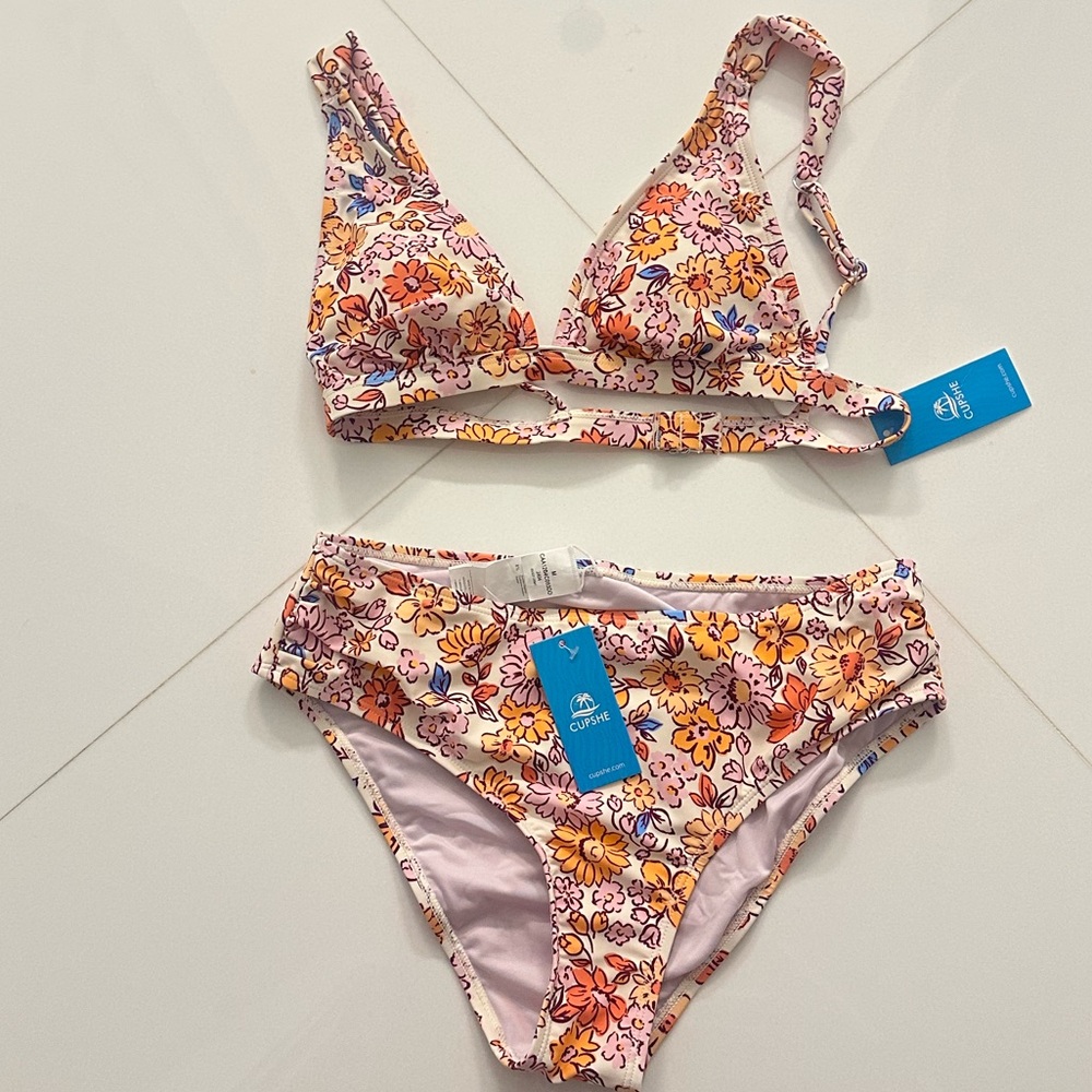 NWT CupShe swimsuit. Padded top in a size Sm and  bottoms are a size Med.